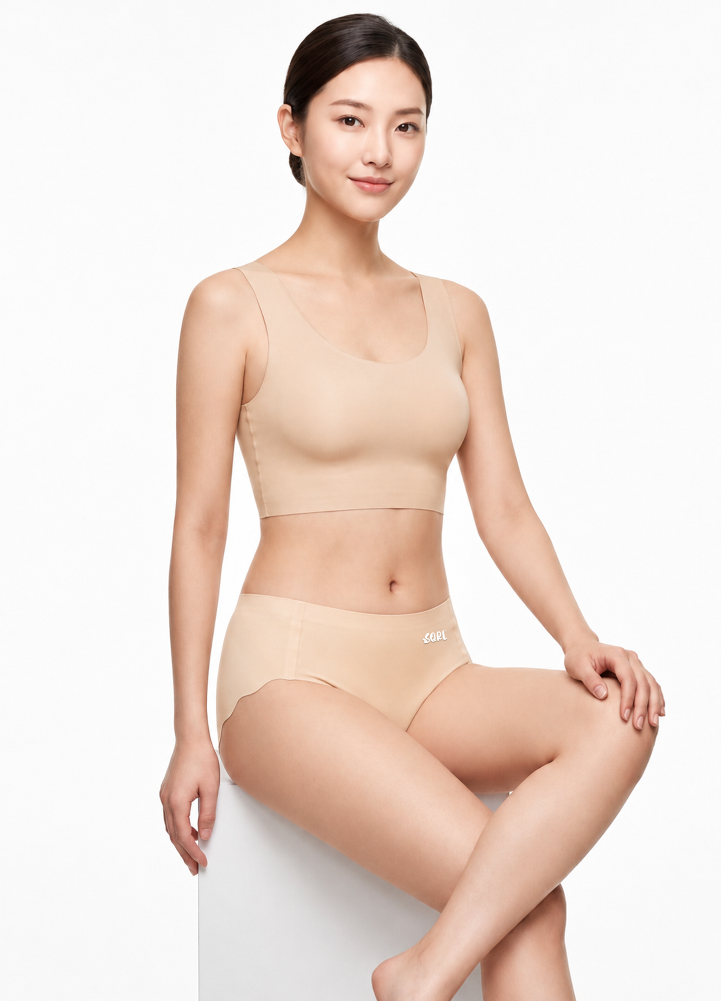 SQRL® Low Waist Panties. SQRL low waist seamless panties in beige showing zero panty line invisible fit.
